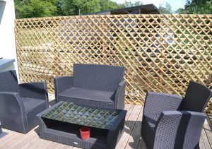 Pare vent design en bambou salon brut